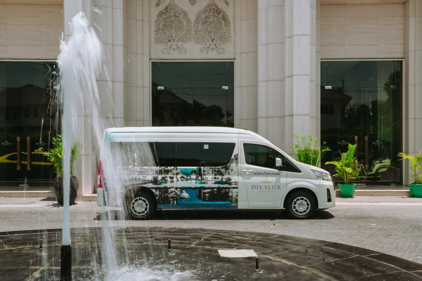 Divalux airport shuttle van at the hotel entrance