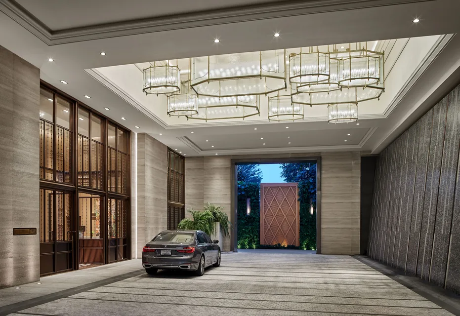 Arrival hall with chandeliers at Rosewood Bangkok via Expedia