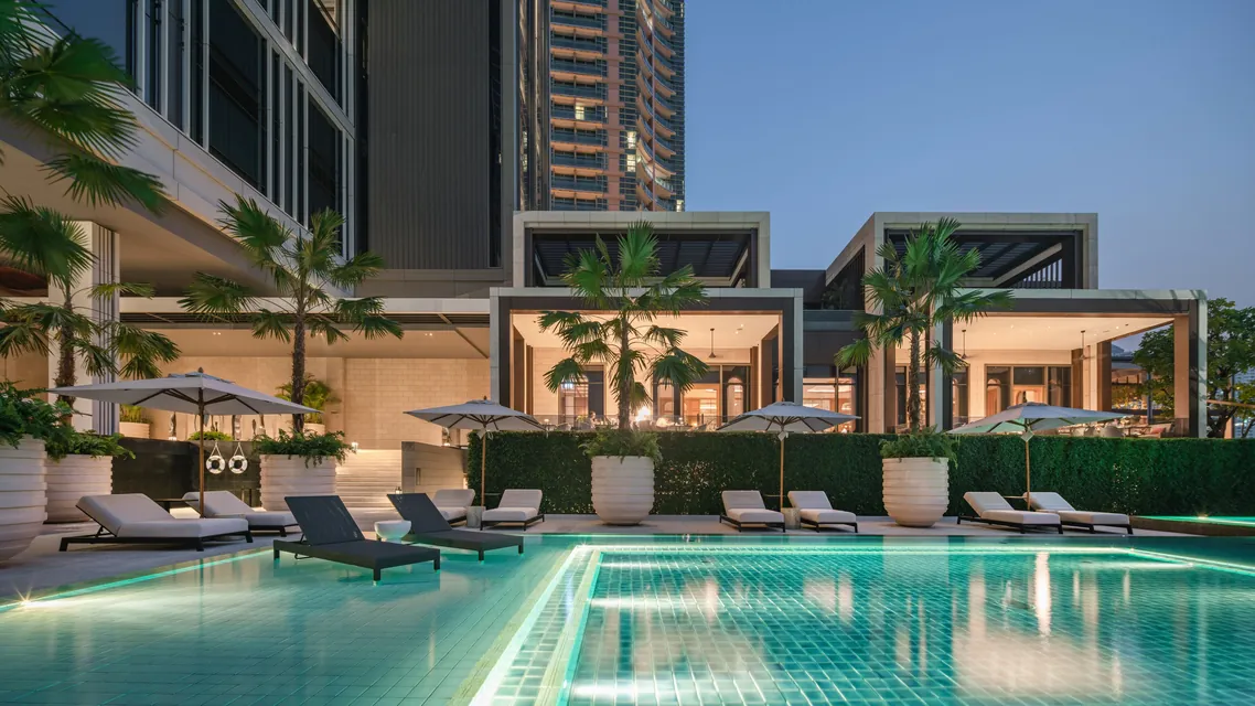 Pool and cabanas at Four Seasons Hotel Bangkok via Expedia
