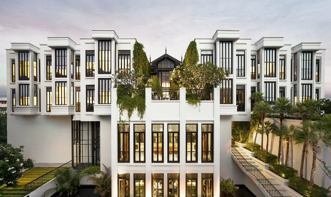 The Siam hotel facade and garden in Bangkok via Expedia