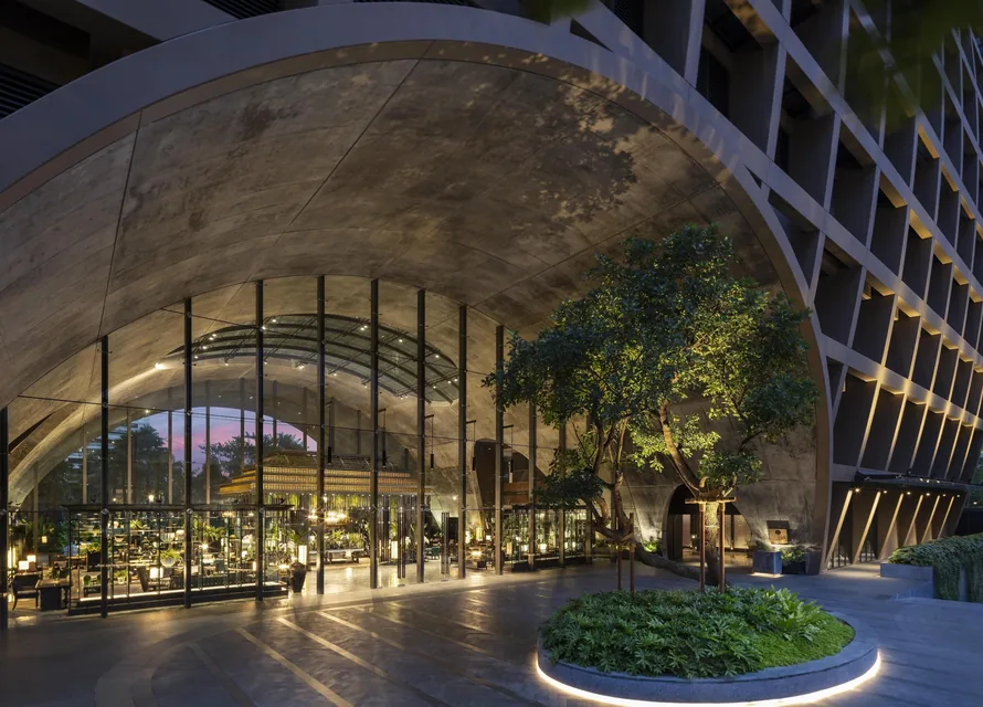 Arched glass atrium at Sindhorn Kempinski Hotel Bangkok via Expedia