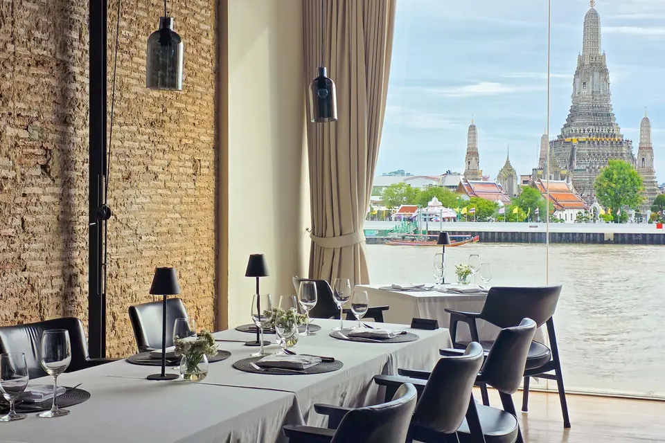 Dining room facing Wat Arun across the river at Sala Rattanakosin Bangkok via Expedia