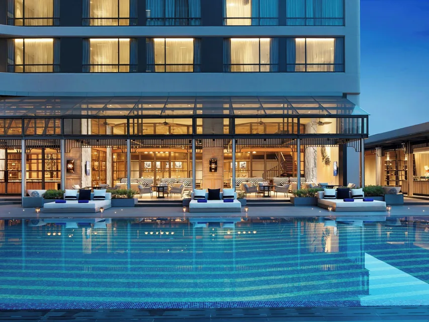 Pool and terrace at Bangkok Marriott Marquis Queen's Park via Expedia