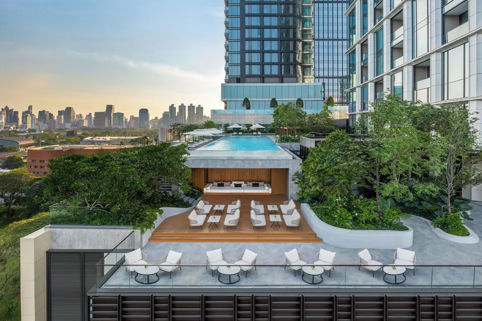 The Ritz-Carlton Bangkok pool deck and gardens below the tower via Expedia