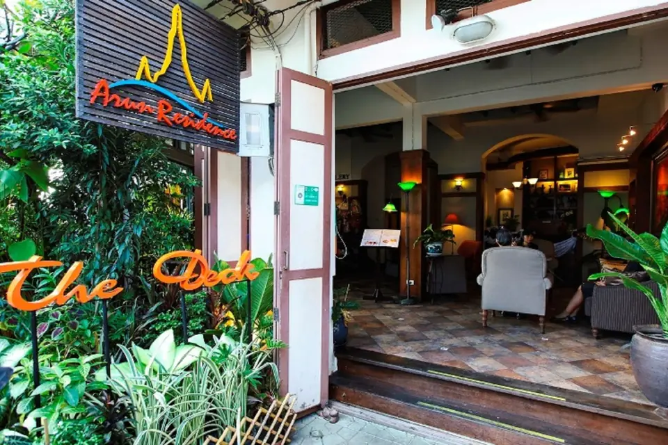Arun Residence entrance with garden planting via Expedia